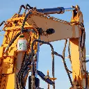 DripLock-on-Excavator-e1737462952697-scaled.webp